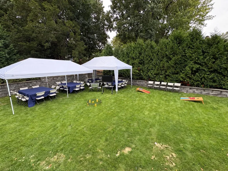 Bongo backyard tents and seating with optional lawn games pictured