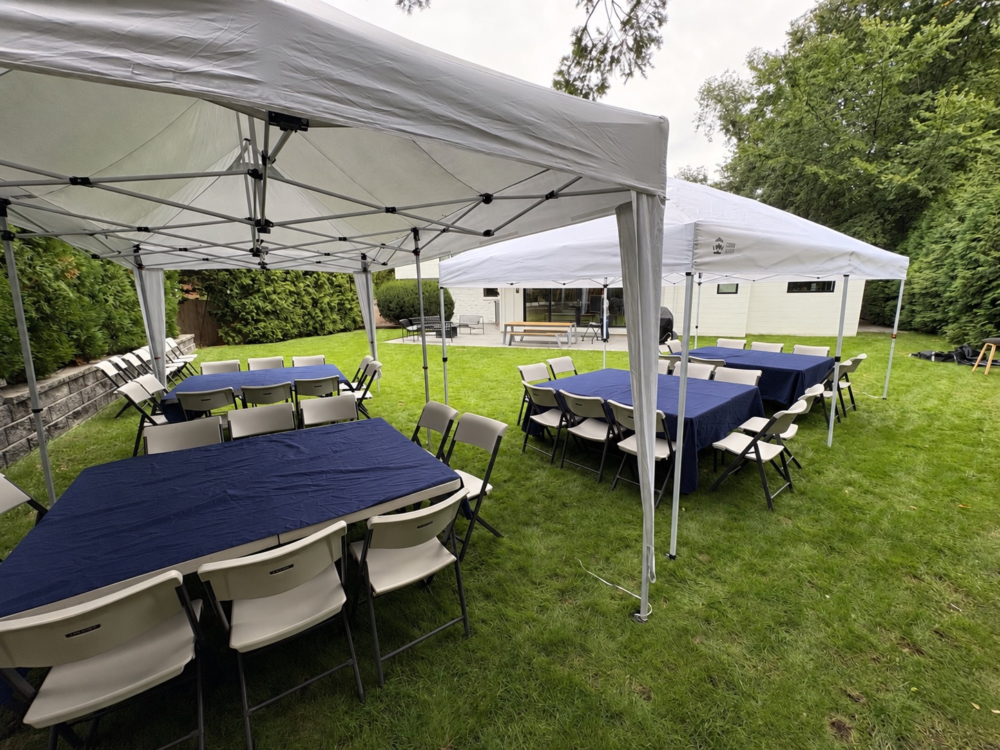 Tables and chairs under the tents